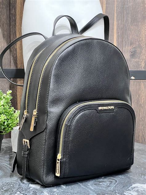 all black michael kors backpack|michael kors black leather backpack.